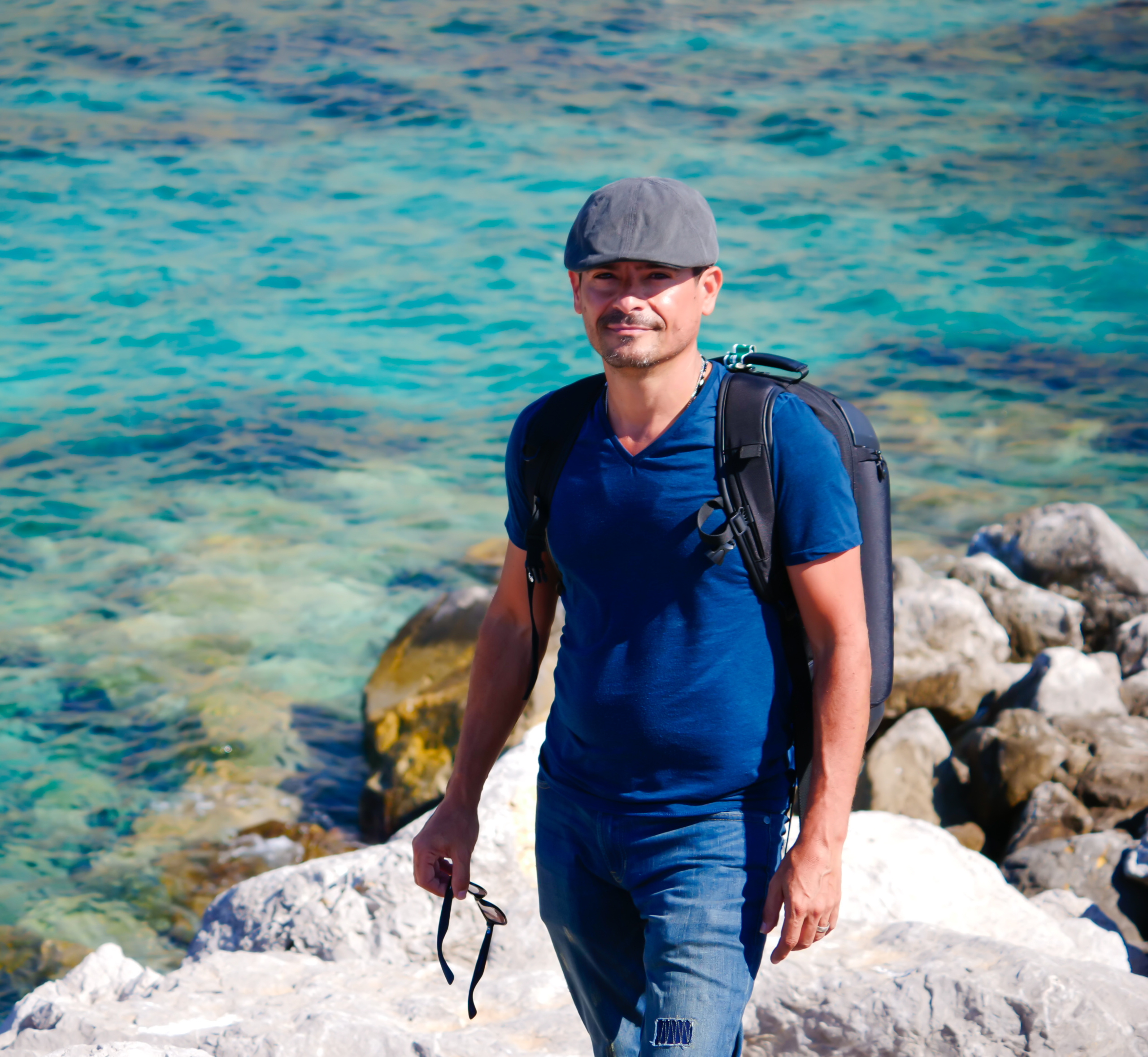 Filippo, co-founder of AZ Wedding Photographer, exploring the crystal clear shores of Italy/Sicily.