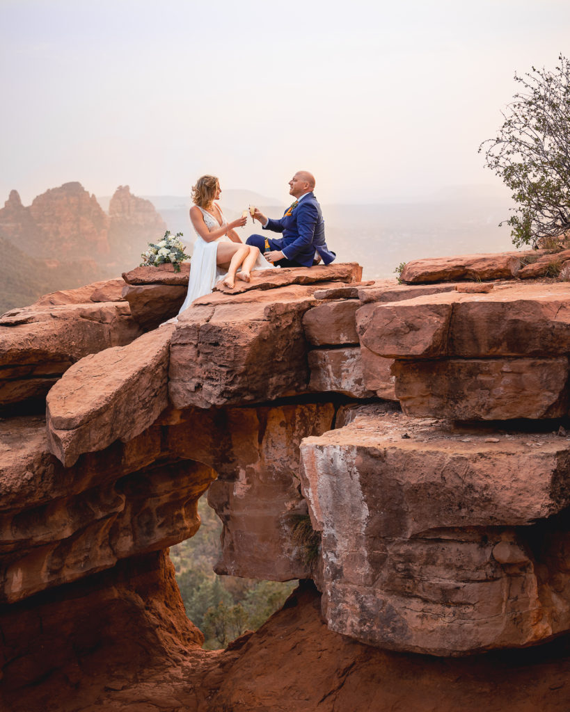 Aimee & Justin's Real Wedding at Lovers Knoll and Merry GO Round Sedona, Arizona - A Toast To Us