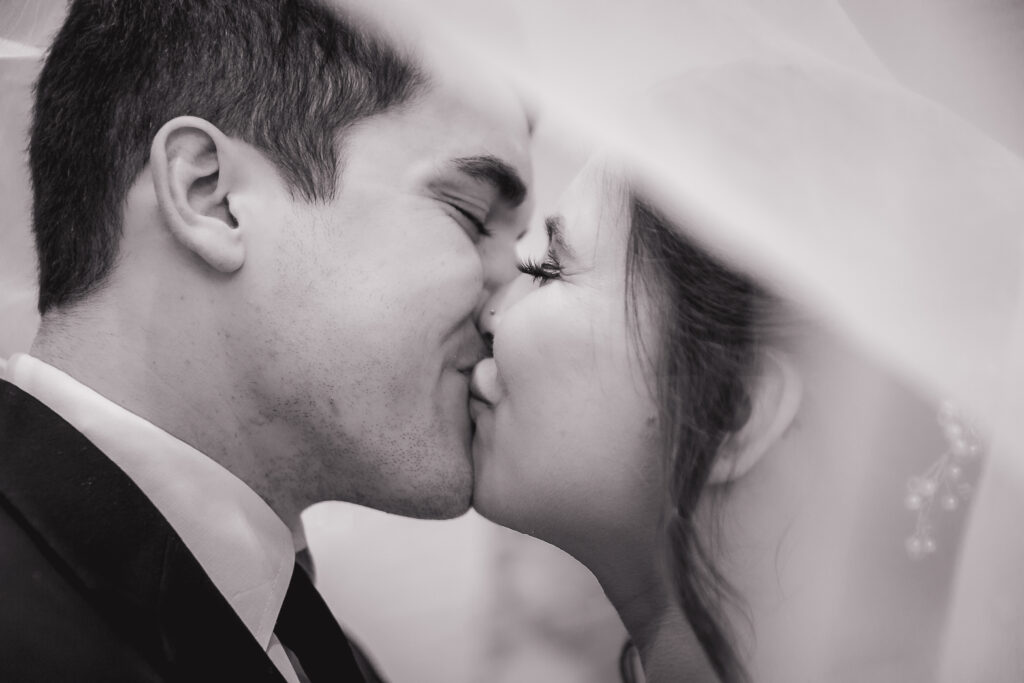 bride and groom kissing